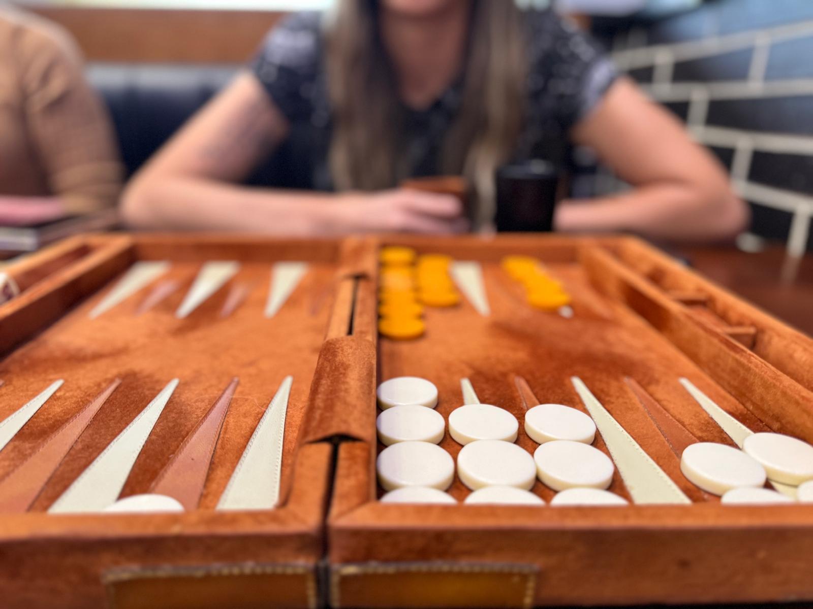 Close-up of a backgammon board with pieces